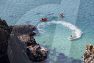 ‘Respect the water’: RNLI lifeguard training in Cornwall. Ahead of a busy summer of domestic tourism in the UK, qualified lifeguards and trainees rehearse life-saving procedures