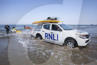 ‘Respect the water’: RNLI lifeguard training in Cornwall. Ahead of a busy summer of domestic tourism in the UK, qualified lifeguards and trainees rehearse life-saving procedures