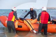 ‘Respect the water’: RNLI lifeguard training in Cornwall. Ahead of a busy summer of domestic tourism in the UK, qualified lifeguards and trainees rehearse life-saving procedures
