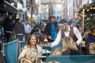 Crowds surge back to London’s West End as lockdown curbs are lifted