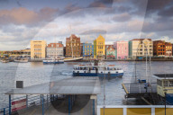 View of Otrobanda ferry terminal and Dutch colonial buildings on Handelskade along Punda's waterfront, UNESCO World Heritage Site, Willemstad, Curacao, West Indies, Lesser Antilles, former Netherlands Antilles, Caribbean, Central America