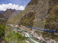 Train between Machu Picchu at Aguas Calientes and Ollantaytambo through the Sacred Valley, Cusco Region, Peru