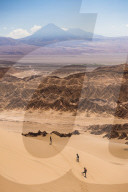 Tourists in sand dunes at Death Valley (Valle de la Muerte), San Pedro de Atacama, Atacama Desert, North Chile