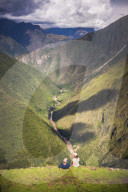 Tourists at Winaywayna Inca Ruins, on Inca Trail Trek day 3, Cusco Region, Peru