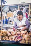 Portrait of Peruvian woman selling meat at San Camilo Market (Mercado San Camilo), Arequipa, Peru