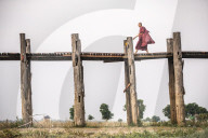 Buddhist Monk on U Bein Teak Bridge, a 1.2km wooden bridge, Mandalay, Mandalay Region, Myanmar (Burma)