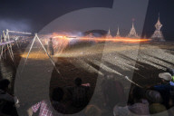 Mrauk U, firing a rocket at a monks coffin at Dung Bwe Festival, Rakhine State, Myanmar (Burma)
