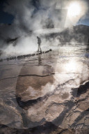 Tourist at El Tatio Geysers (Geysers del Tatio), the largest geyser field in the Southern Hemisphere, Atacama Desert, Chile