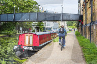 Cycling by the Canal at Ladbroke Grove in the Royal Borough of Kensington and Chelsea, London, England, United Kingdom