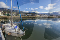 Sailboats docked along the small boat harbor in Ushuaia, Argentina