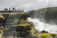 Tourists visiting Gullfoss (Golden Falls), a waterfall located in the canyon of the Hvita River in southwest Iceland, Polar Regiions