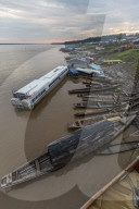 Various boats along the banks of the Amazon River, Loreto, Peru