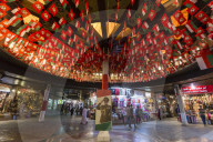 Flags and Sultan's portrait decorate Mutrah Souq for Oman National Day, 18 November, Muscat, Oman, Middle East
