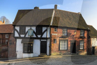 Half-timbered Harlequin, antique book store in historic building, Steep Hill, Cathedral Quarter, Lincoln, Lincolnshire, England