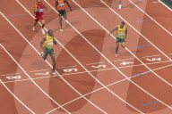 Usain Bolt crosses line with finger to lips, looks at Yohan Blake, Men's 200m final, London 2012, Olympic Games, London, England, United Kingdom, Europe