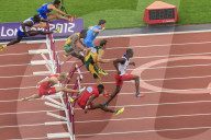 Competitors in Men's 110m hurdles semi-final clear hurdles, London 2012 Stadium, Summer Olympic Games, London, England, United Kingdom, Europe