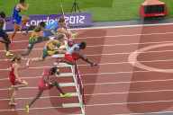 Competitors in Men's 110m hurdles semi-final clear hurdles, London 2012 Stadium, Summer Olympic Games, London, England, United Kingdom, Europe