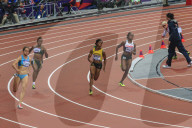 Shelly-Ann Fraser-Pryce, Jamaica, runs the bend in the Women's 200m round 1, London 2012, Summer Olympic Games, London, England, United Kingdom, Europe