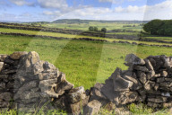 Dry stone wall, with view across a beautiful typical country landscape in spring, Peak District National Park, Derbyshire, England, Unnited Kingdom, Europe