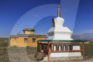 Colourful small temple and vibrant stupa in countryside under blue sky, Summer, Dundgov, North Gobi, Mongolia