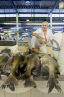 Fishmonger in Belem fish market in the Amazon
