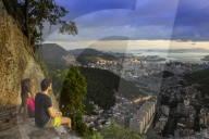 Hikers looking out over Rio from the Morro dos Cabritos