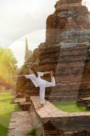 Yoga practitioner at a Thai temple, Thailand, Southeast Asia, Asia