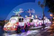 Brightly coloured illuminated pedal cars in Yogyakarta city, Java, Indonesia, Southeast Asia, Asia