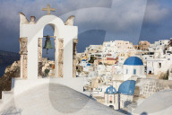 The white of the church and of houses and the blue of Aegean Sea as symbols of Greece Oia Santorini Cyclades Greece Europe