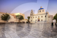 The Holy Orthodox Church of Panagia with the colors white and blue the icons of Greece Oia Santorini Cyclades Europe