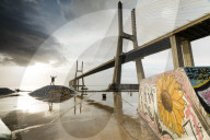 The colorful murals around Vasco Da Gama bridge emphasize its architecture and atmosphere at dawn Lisbon Portugal Europe