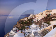 View of the Aegean Sea from the typical greek village of Oia at dusk Santorini Cyclades  Greece Europe