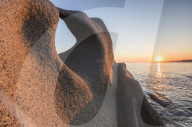 Sunset on the unusual shapes of cliffs and blue sea Capo Testa Santa Teresa di Gallura Province of Sassari Sardinia Italy Europe