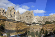 Blue sky on the rocky peaks and typical autumn landscape at Gardena Pass South Tyrol Trentino Alto Adige Italy Europe