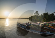 Fishing boats at sunset on the Suriname river near  Paramaribo, Suriname