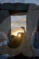Revellers gather at historic monument for Summer Solstice celebrations on 21 June 2016, Stonehenge, UNESCO World Heritage Site, Wiltshire, England, United Kingdom, Europe