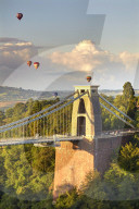Clifton Suspension Bridge, with hot air balloons in the Bristol Balloon Fiesta (August), Clifton, Bristol, Great Britain.