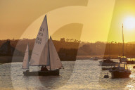 A sunset view of sailing on the River Exe at Topsham, near Exeter, Devon, Great Britain.
