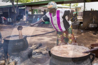 The women of of Kasalagu Womens Cooperative, making Organic Shea butter for Tama.  Tamale, Northern Region, Ghana.
