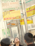 commuters waiting for a buses, Shanghai CHina