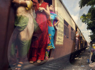 Commuters on a packed trains, Mumbai, India
