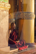 Monk meditating at Shwedagon Pagoda, Yangon (Rangoon), Myanmar (Burma), Asia
