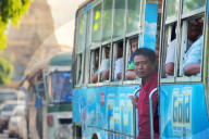 Commuters on a packed city bus, Yangon (Rangoon), Myanmar (Burma), Asia
