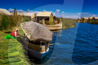 Quechua Indian Family on Floating Grass islands of Uros, Lake Titicaca, Peru