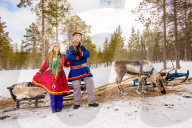 Couple wearing Traditional Sami costumes, Reindeer Safari, Kakslauttanen Igloo Village, Saariselka, Finland