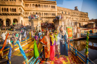 Travelers participating in the Flower Holi Festival, Vrindavan, India