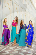 Tourists in Saris standing in front of the Taj Mahal, Agra, Uttar Pradesh, India