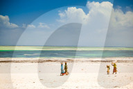 African Women Walking on the beach, Zanzibar Island, Tanzania