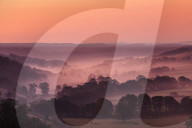 The Littondale valley in the Yorkshire Dales with mist lingering among the trees in the pre dawn light of an autumn morning, Yorkshire, England, United Kingdom, Europe
