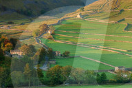 Early morning light on the dry stone walls and fields beside the Yorkshire Dales village of Arncliffe in autumn, North Yorkshire, Yorkshire, England, United Kingdom, Europe